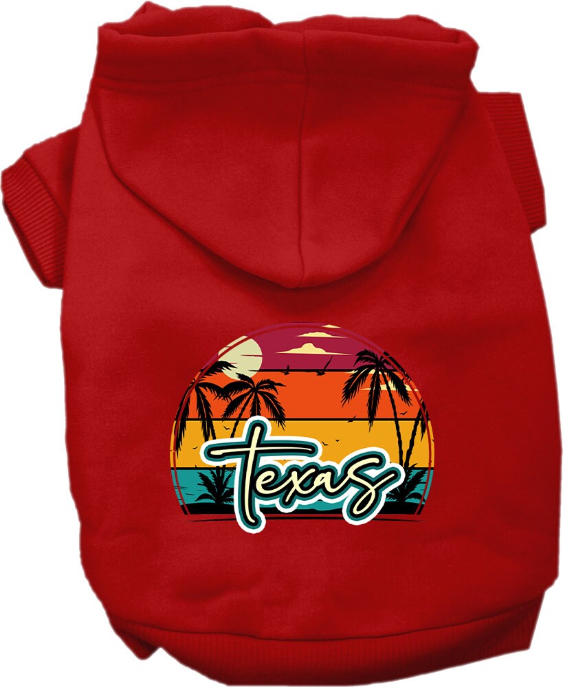 A small to medium pet wearing a stylish Texas Retro Beach Sunset hoodie, showcasing vibrant colors and a cozy fit.