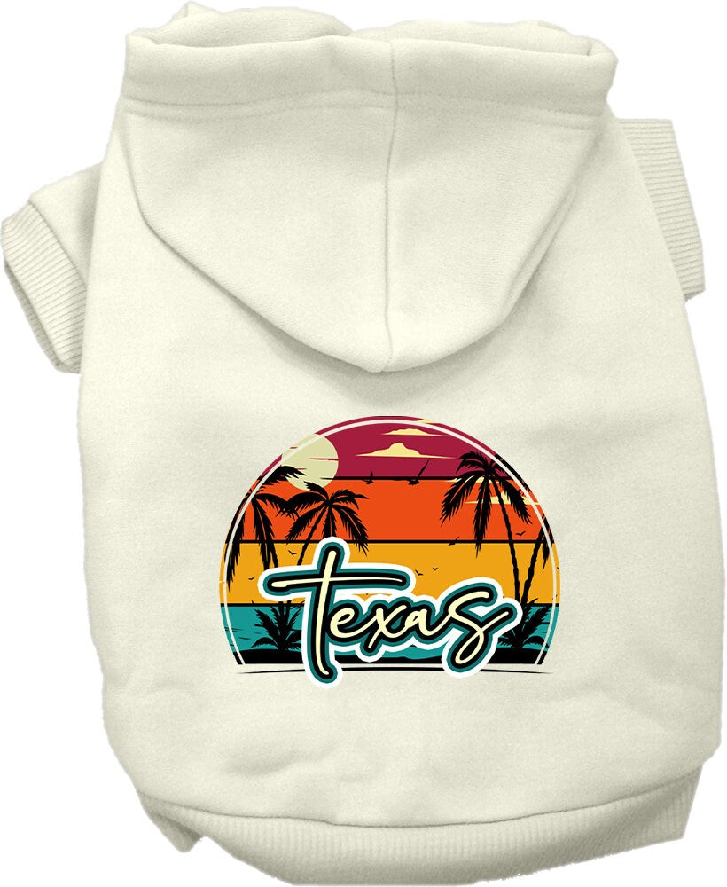 A small to medium pet wearing a stylish Texas Retro Beach Sunset hoodie, showcasing vibrant colors and a cozy fit.