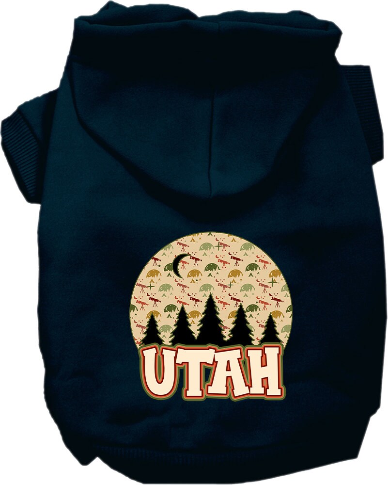 A small to medium pet wearing a cozy screen printed hoodie with a 'Utah Under The Stars' design, showcasing its soft fabric and convenient leash access.