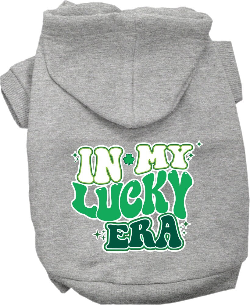 A cozy pet hoodie for dogs and cats, featuring the phrase 'In My Lucky Era' in a stylish screen print, designed for small to medium pets.