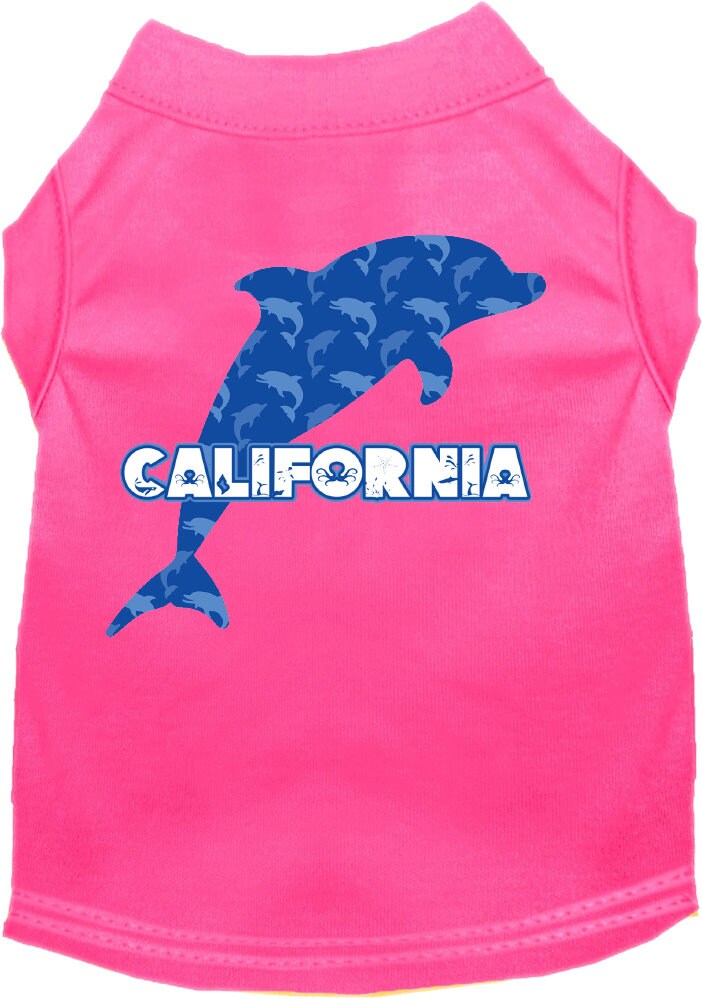 A medium to large pet wearing a soft, screen printed shirt featuring a California Blue Dolphins design, showcasing comfort and style.