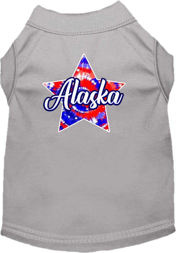 A medium to large pet wearing a colorful Alaska Patriotic Tie Dye shirt, showcasing its vibrant design and comfortable fit.