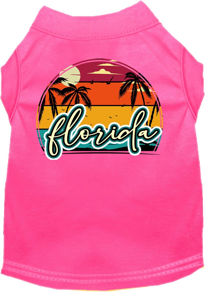 A medium to large pet wearing a Florida Retro Beach Sunset screen printed shirt, showcasing vibrant colors and a comfortable fit.