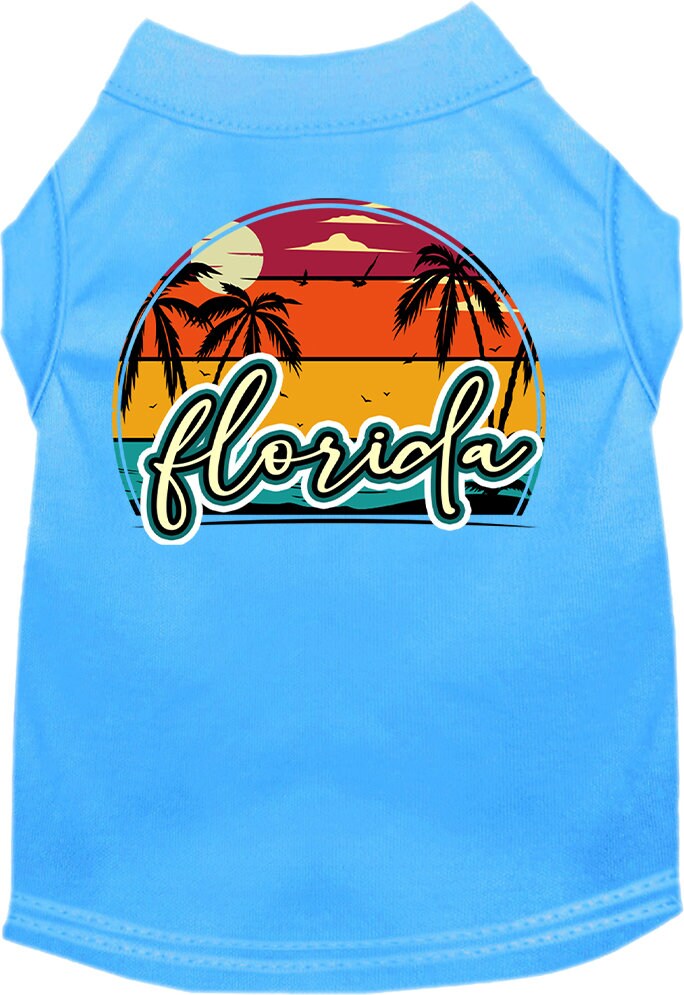 A medium to large pet wearing a Florida Retro Beach Sunset screen printed shirt, showcasing vibrant colors and a comfortable fit.