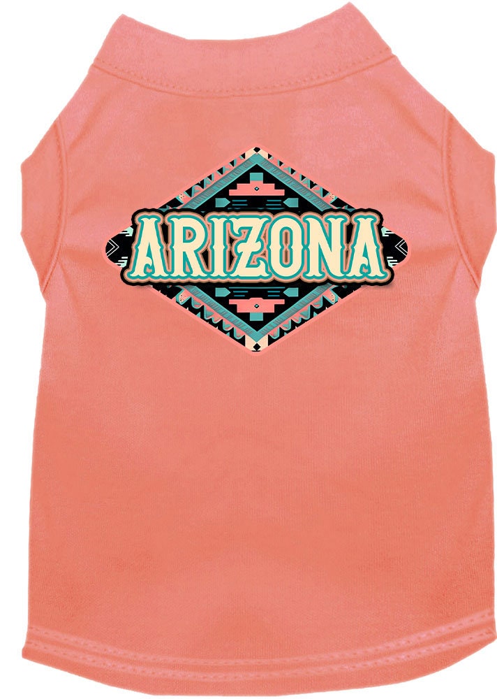A medium to large pet wearing a stylish Arizona Peach Aztec screen printed shirt, showcasing its vibrant colors and comfortable fit.