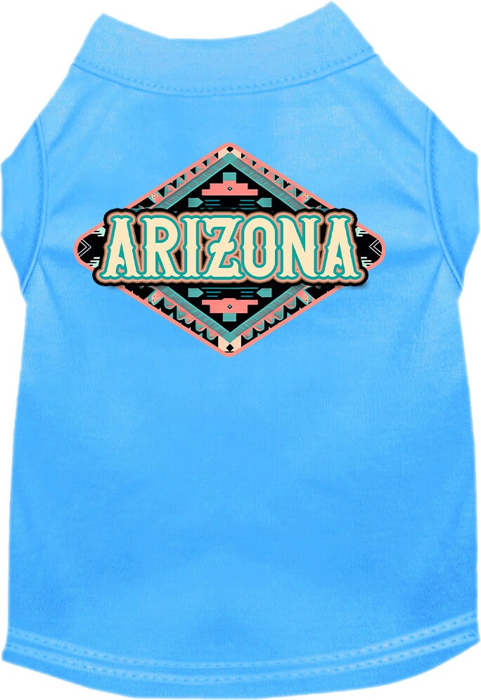 A medium to large pet wearing a stylish Arizona Peach Aztec screen printed shirt, showcasing its vibrant colors and comfortable fit.