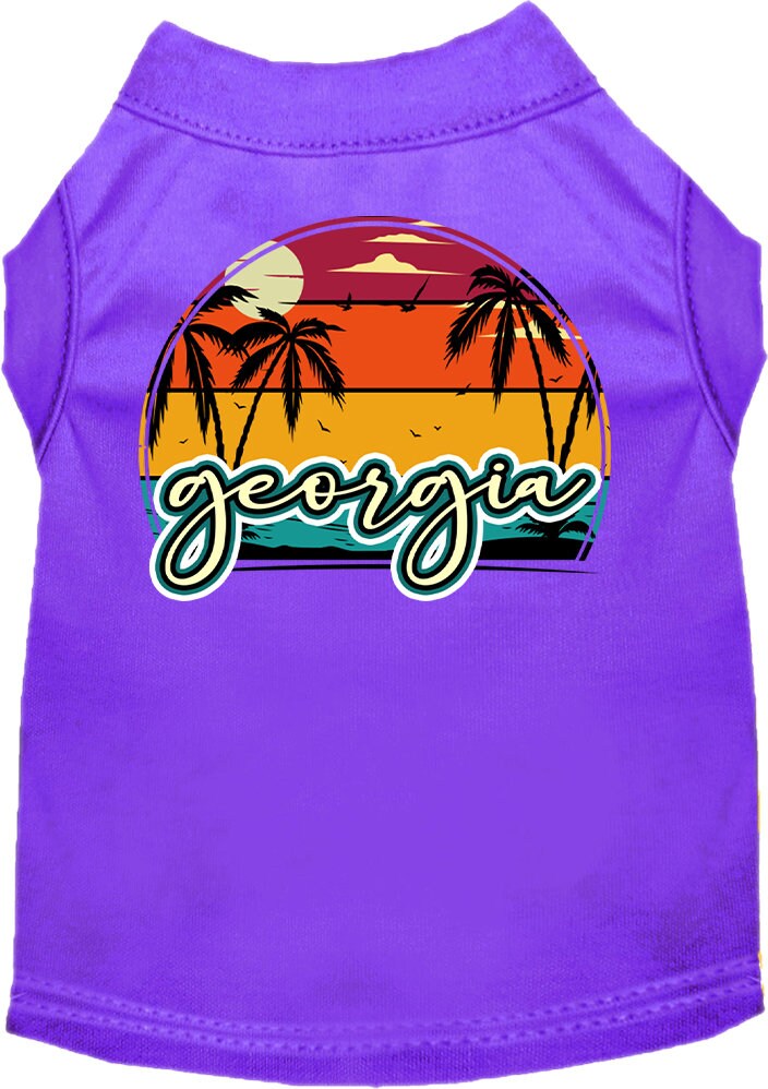 A medium to large pet wearing a soft, screen printed shirt featuring a vibrant Georgia Retro Beach Sunset design.