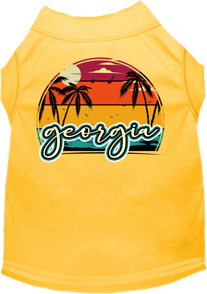 A medium to large pet wearing a soft, screen printed shirt featuring a vibrant Georgia Retro Beach Sunset design.