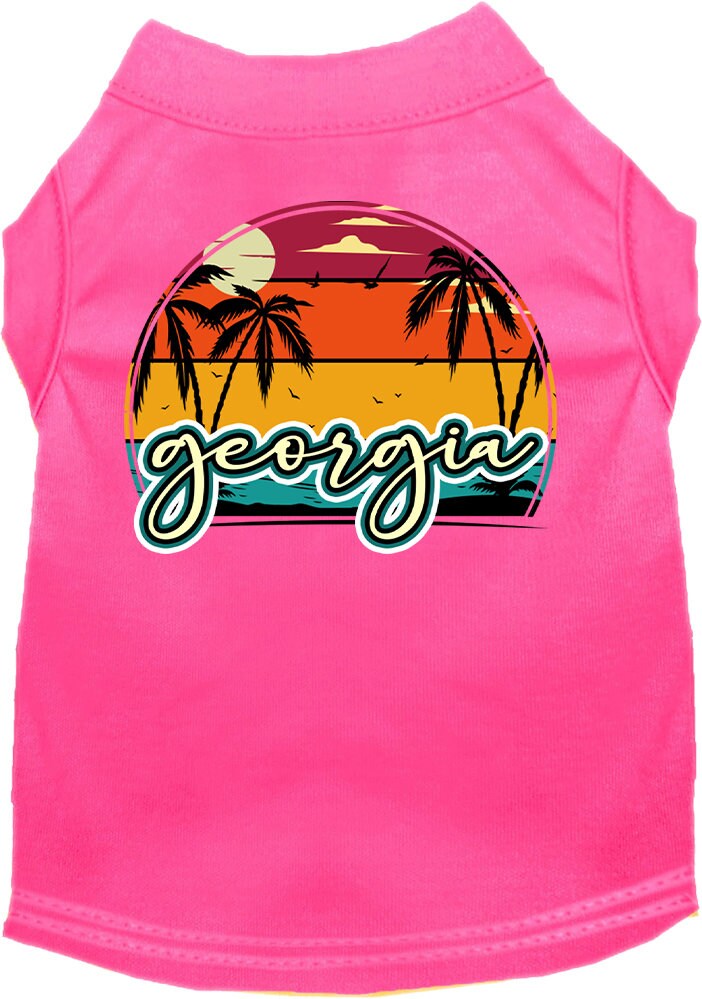 A medium to large pet wearing a soft, screen printed shirt featuring a vibrant Georgia Retro Beach Sunset design.