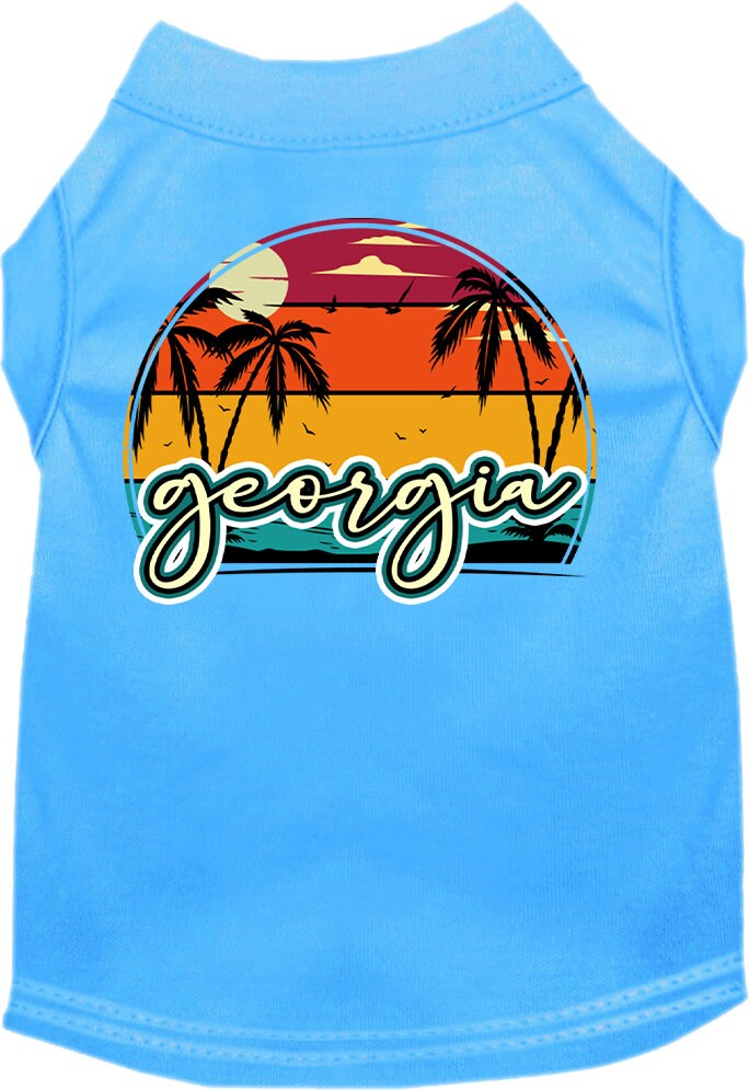 A medium to large pet wearing a soft, screen printed shirt featuring a vibrant Georgia Retro Beach Sunset design.