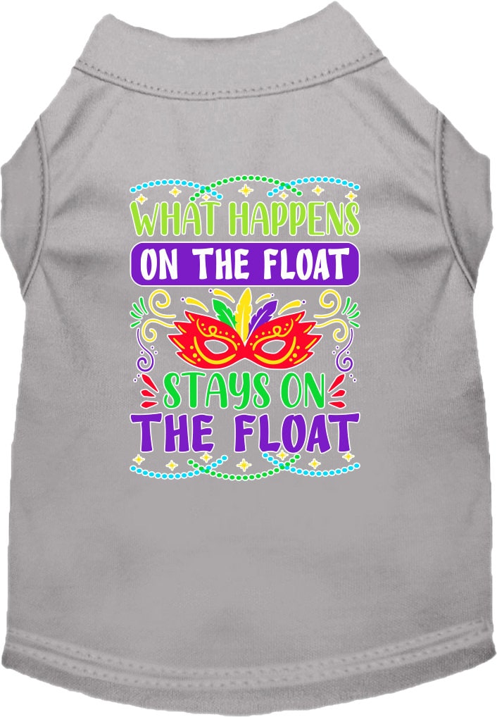 A small to medium pet wearing a screen printed shirt with the slogan 'What Happens On The Float, Stays On The Float', showcasing a fun summer style.