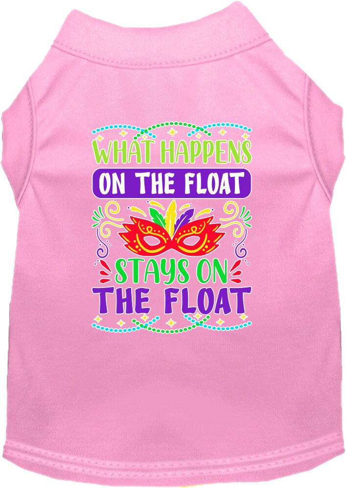 A small to medium pet wearing a screen printed shirt with the slogan 'What Happens On The Float, Stays On The Float', showcasing a fun summer style.