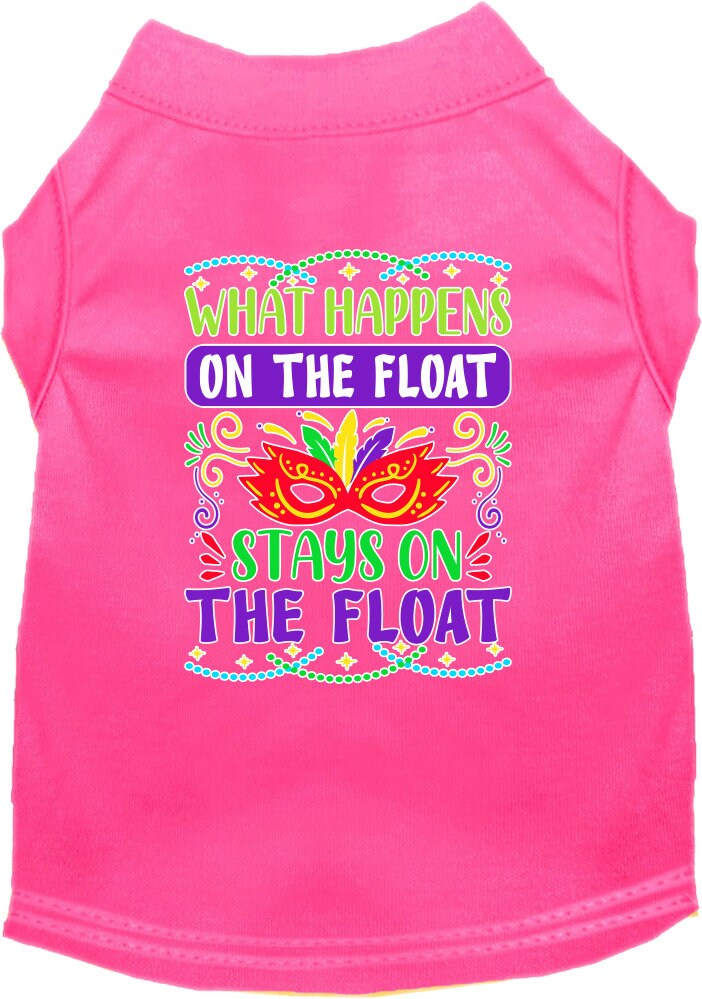 A small to medium pet wearing a screen printed shirt with the slogan 'What Happens On The Float, Stays On The Float', showcasing a fun summer style.