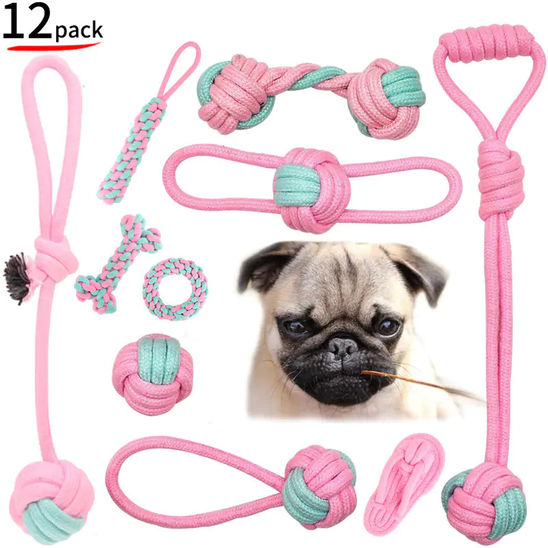 A durable pink cotton rope chew toy designed for dogs, promoting dental health and providing entertainment.