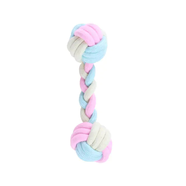 A durable pink cotton rope chew toy designed for dogs, promoting dental health and providing entertainment.