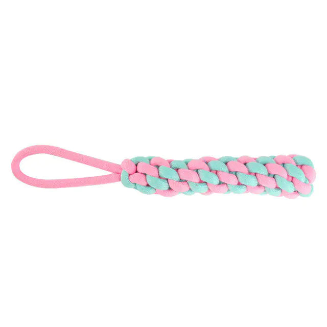 A durable pink cotton rope chew toy designed for dogs, promoting dental health and providing entertainment.