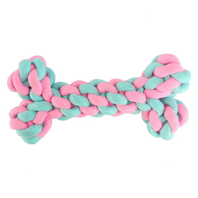 A durable pink cotton rope chew toy designed for dogs, promoting dental health and providing entertainment.