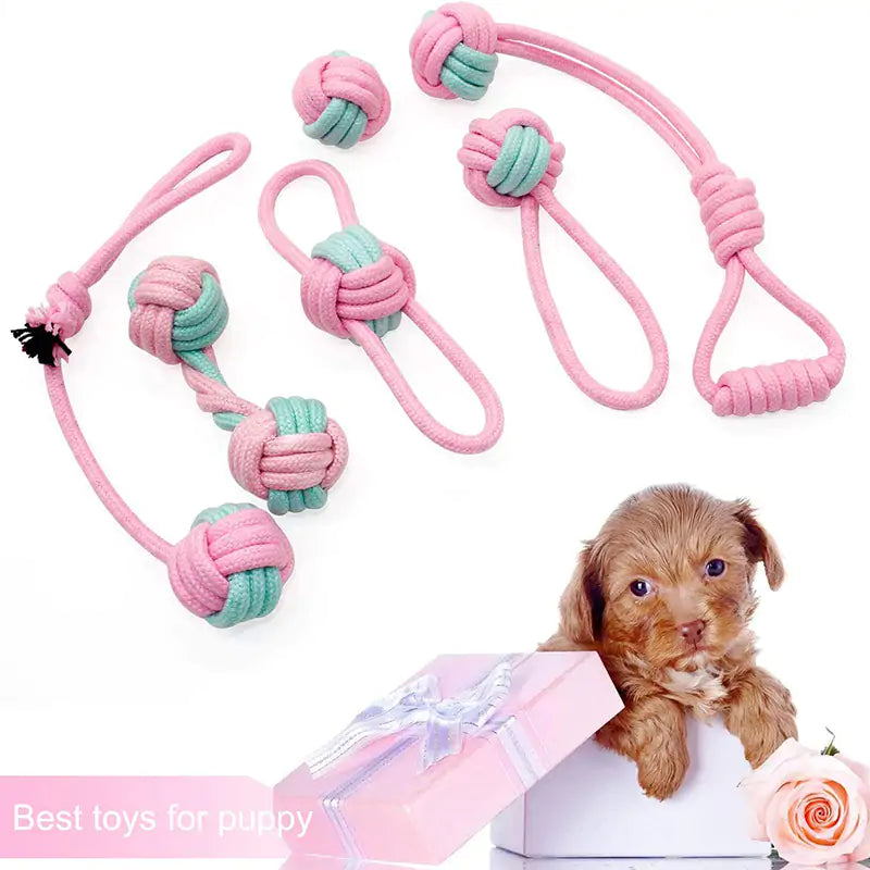 A durable pink cotton rope chew toy designed for dogs, promoting dental health and providing entertainment.