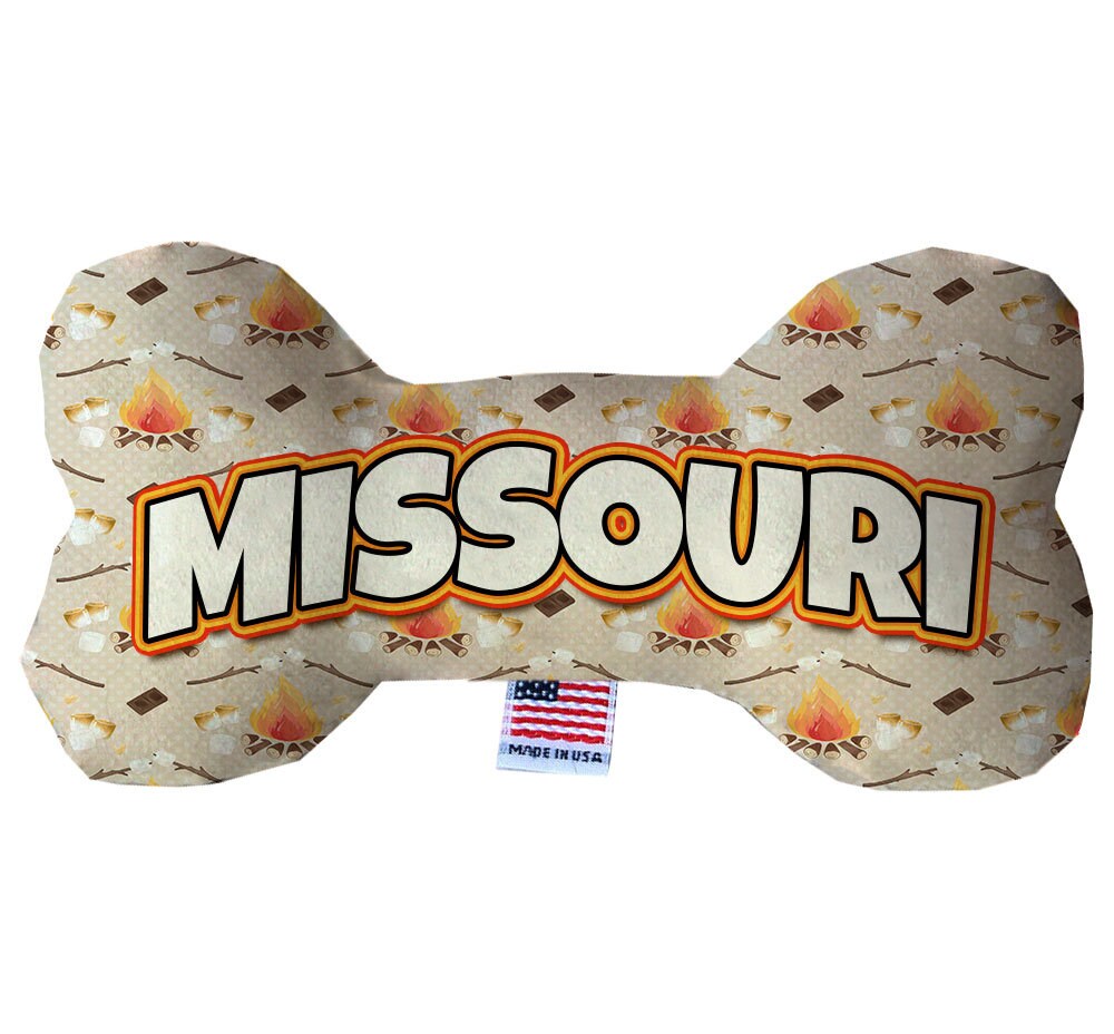 A collection of Missouri State plush bone toys in various patterns and sizes, showcasing their soft texture and squeaker features.