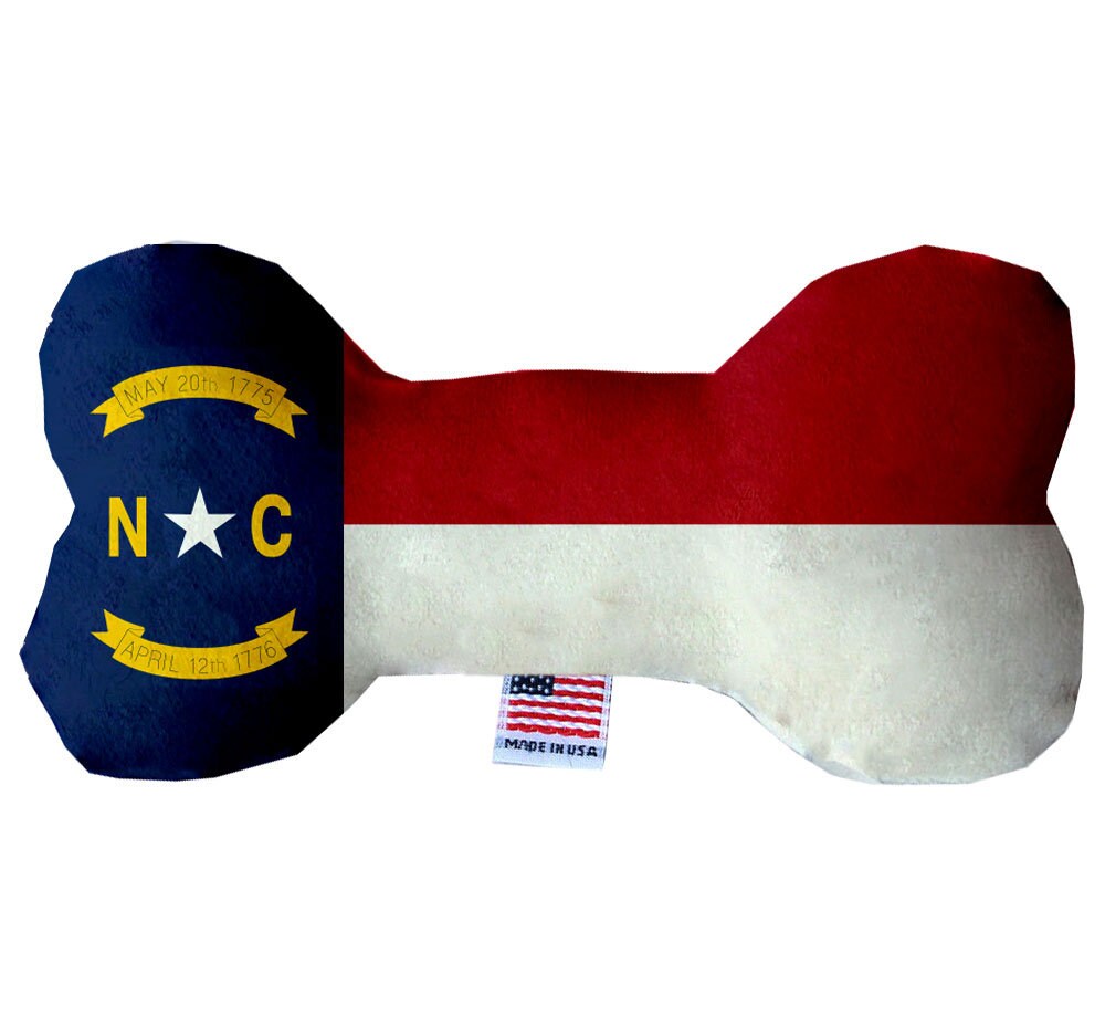 Handmade plush bone toys for dogs featuring North Carolina Mountains design, available in various sizes and patterns.