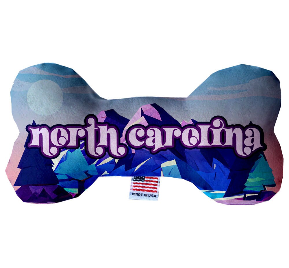 Handmade plush bone toys for dogs featuring North Carolina Mountains design, available in various sizes and patterns.