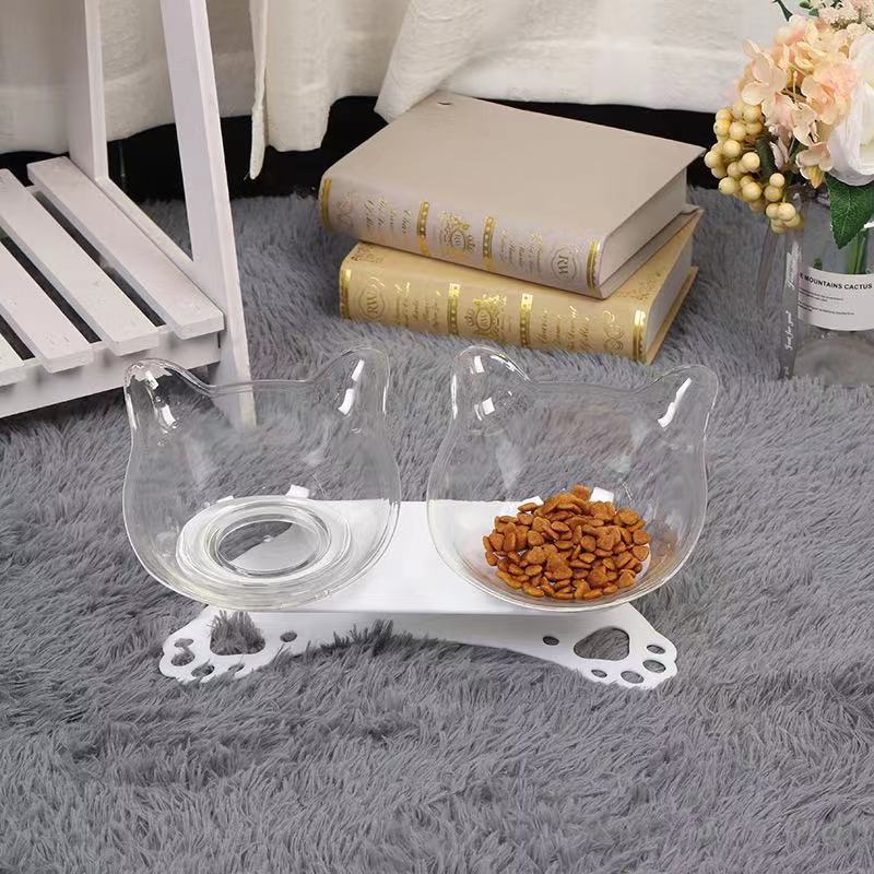 Pet Neck Protection Double Bowl with ergonomic 15-degree design, suitable for cats and small pets, made from durable plastic.