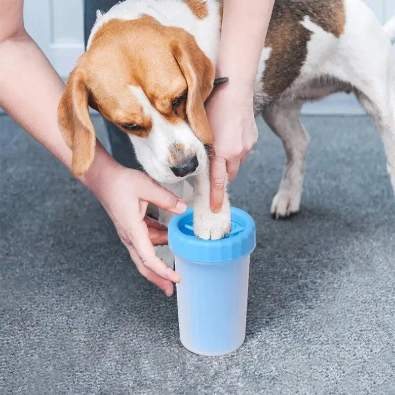 A Pet Wash Cup designed for cleaning pet paws, featuring soft brushes and a durable silicone body, ideal for keeping floors clean.