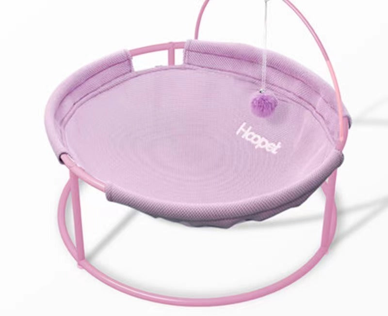 A cozy and stylish pets bed designed for both winter and summer, featuring a soft hammock and a pill toy, perfect for cats of all ages.