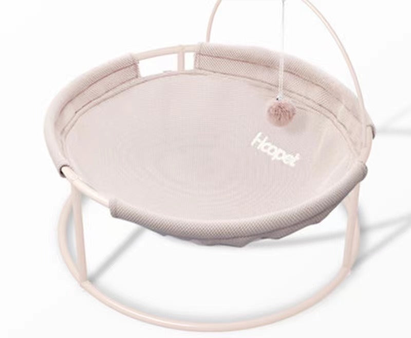 A cozy and stylish pets bed designed for both winter and summer, featuring a soft hammock and a pill toy, perfect for cats of all ages.