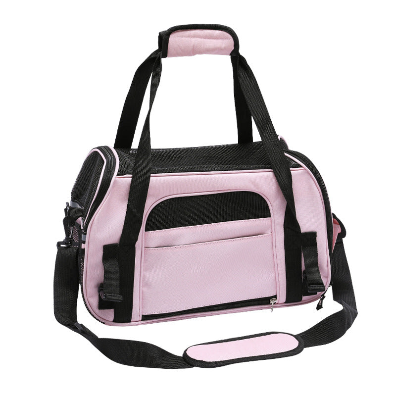 A stylish and durable pet carrier with transparent design and ventilation holes, perfect for traveling with pets.