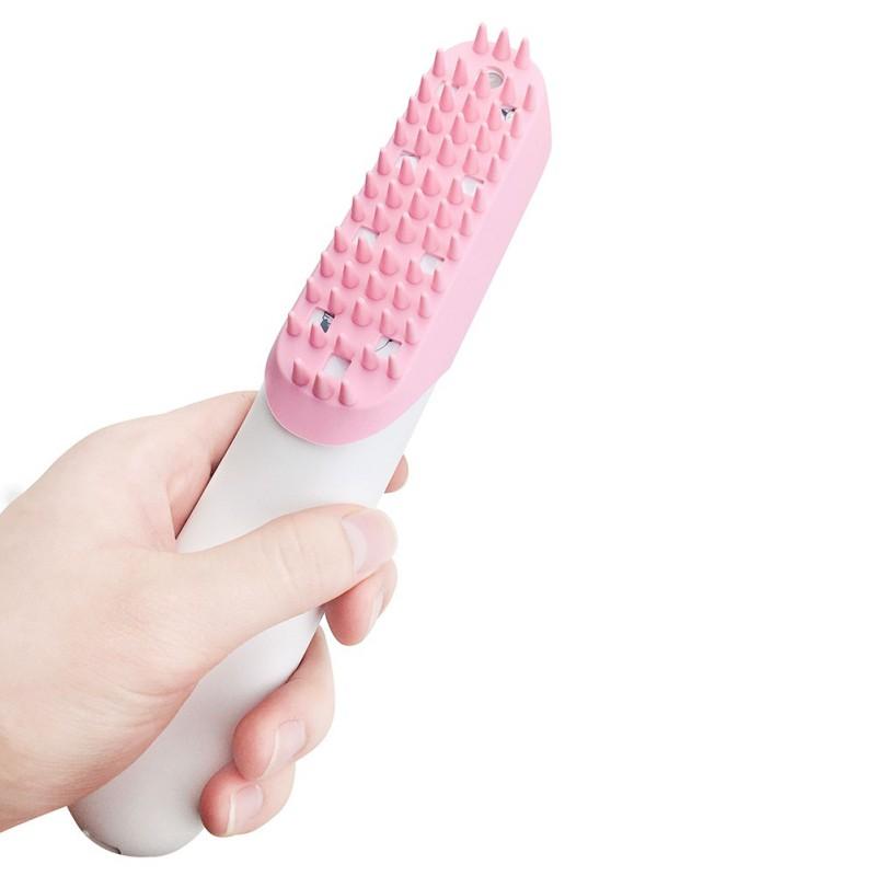 Pets Comb Massage Brush designed for pet grooming, featuring ergonomic design and gentle bristles for effective hair removal and massage.
