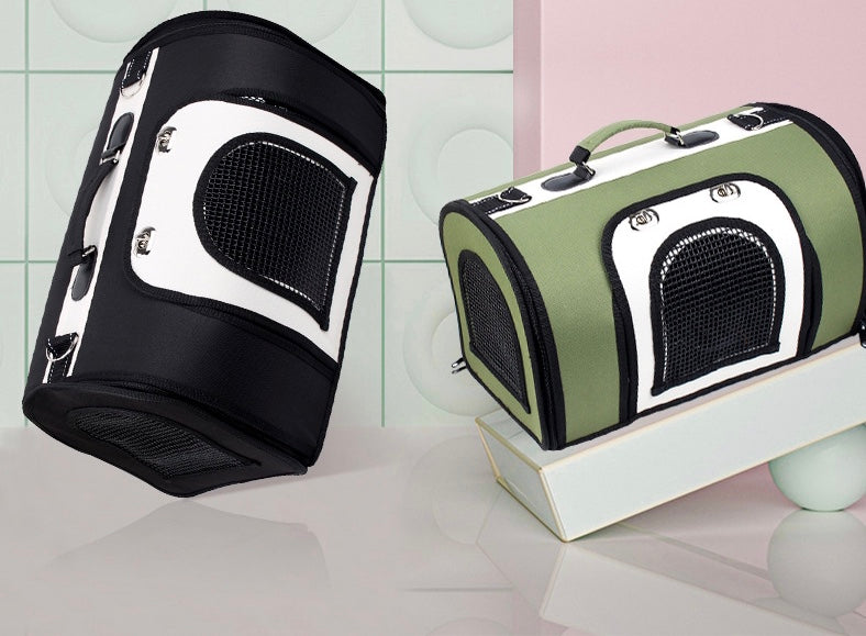 A stylish and functional Pets Handbag designed for comfortable pet travel, featuring a transparent design and ventilation holes.