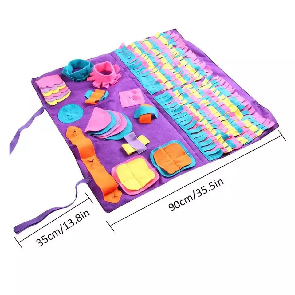 A colorful snuffle mat designed for pets, featuring various textures and hiding spots for treats, promoting mental stimulation and slow feeding.