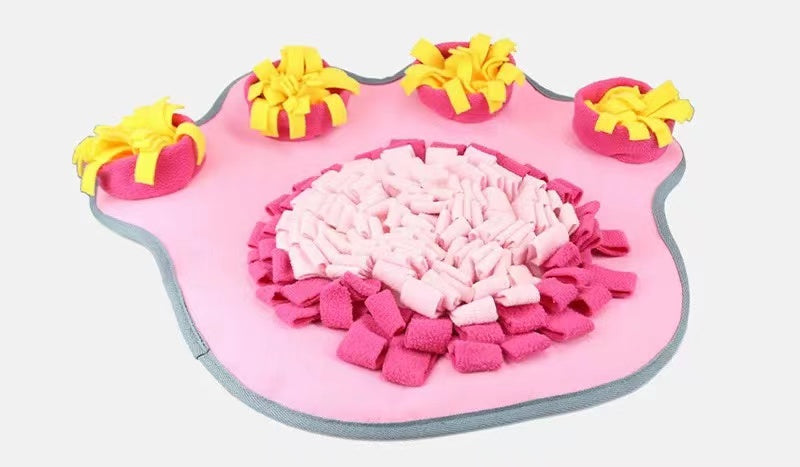 Pets Puzzle Toys Snuffle Mat in pink with paw prints, designed for mental stimulation and slow feeding for pets.