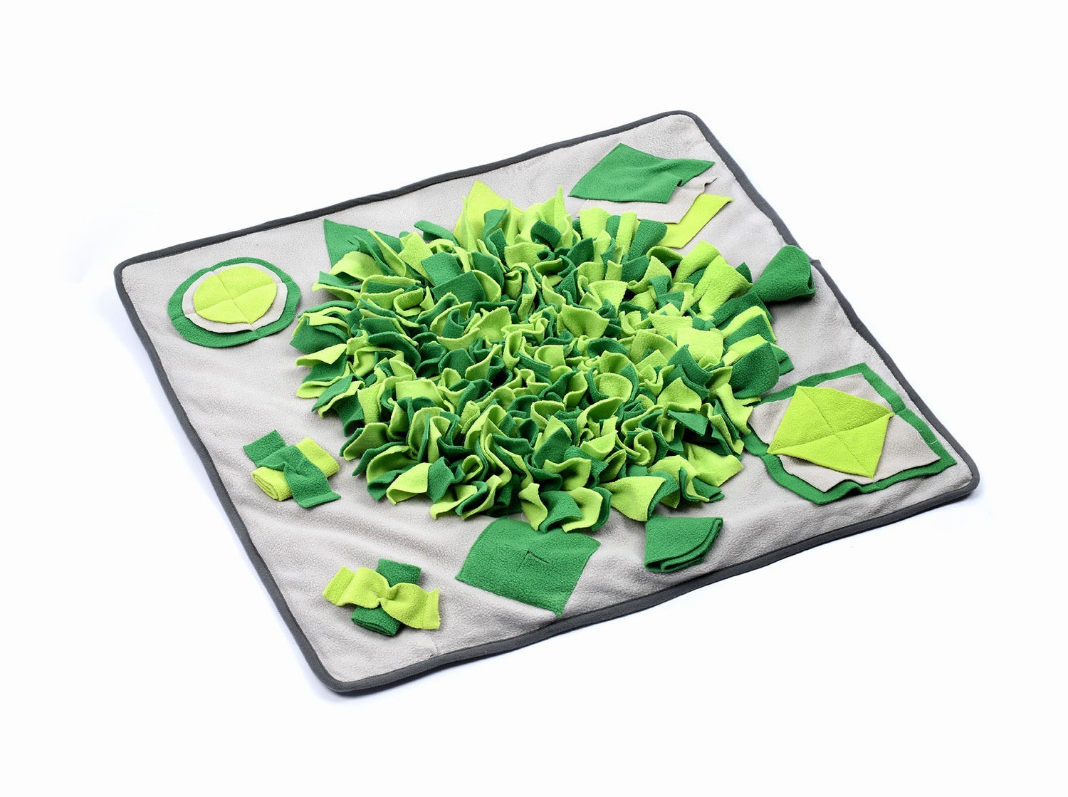 A vibrant green snuffle mat designed for pets, featuring various textures and a rotating top for interactive play and slow feeding.