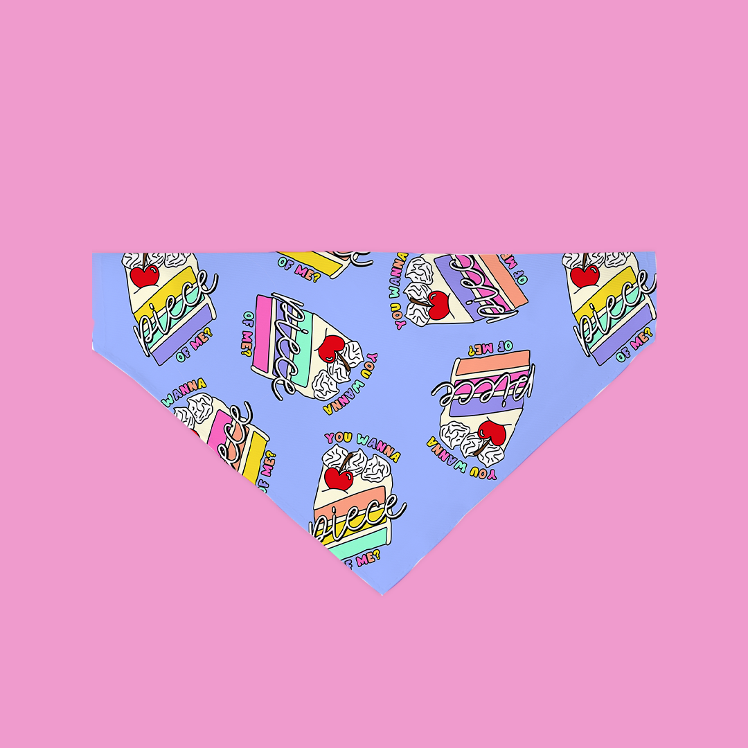 A stylish Piece Of Me Bandana for dogs, featuring unique canvas fabric patterns, designed for a secure fit over collars.