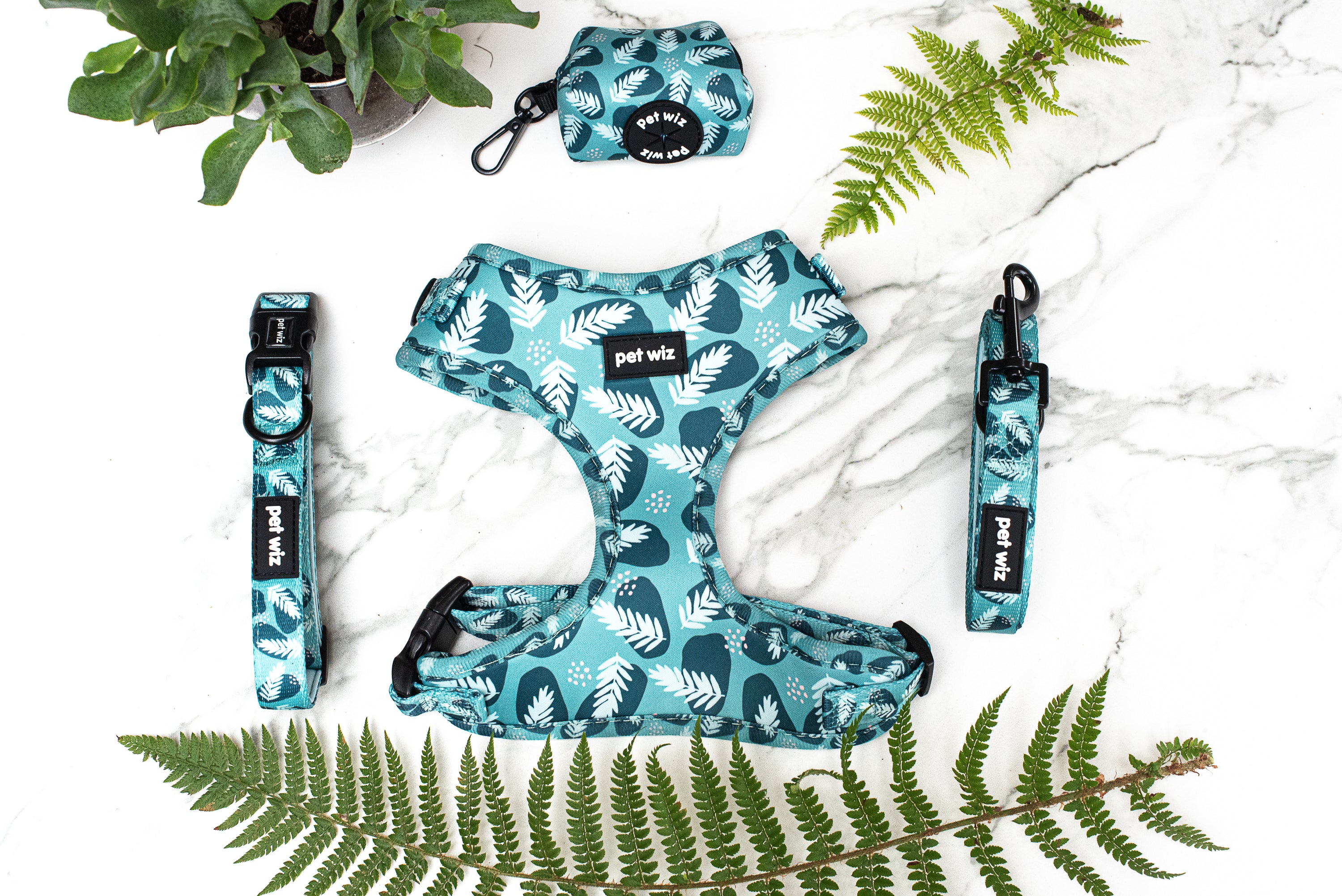 Stylish poop bag holder featuring five unique patterns, designed for convenience and easy access during dog walks.