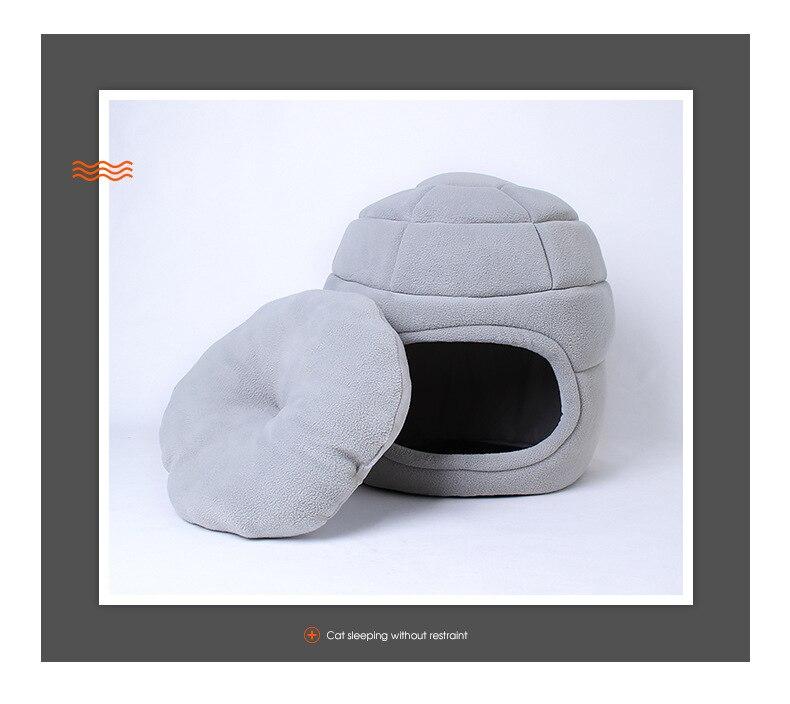 A cozy and portable cat house made of super soft fleece, designed for winter warmth, suitable for both cats and dogs.