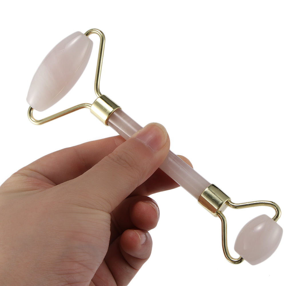 Portable Crystal Double Head Roller Massager with pink quartz crystal, designed for facial massage and skincare.