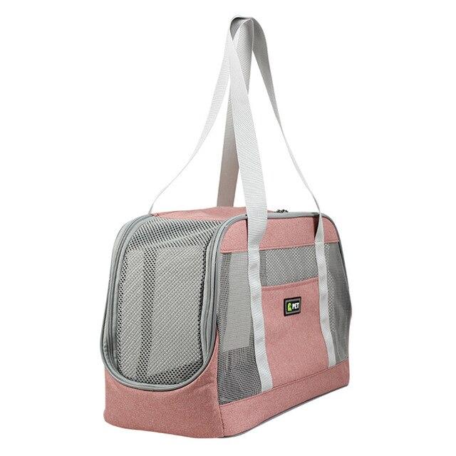 Portable Dog Carrier Bag made of durable Oxford cloth with breathable mesh panels, designed for large pets, featuring a zipper closure and adjustable straps.