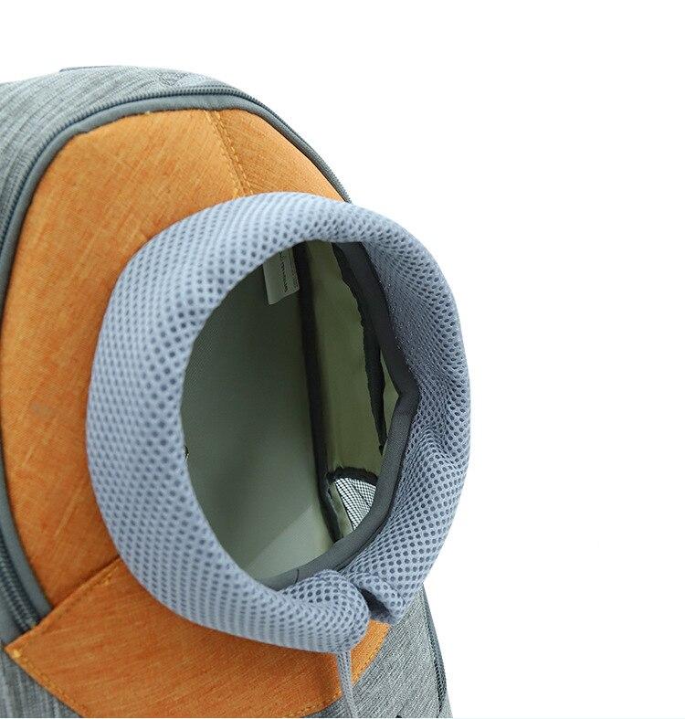 Portable Dog Carrier Bag featuring breathable mesh, adjustable straps, and stylish design for small pets.