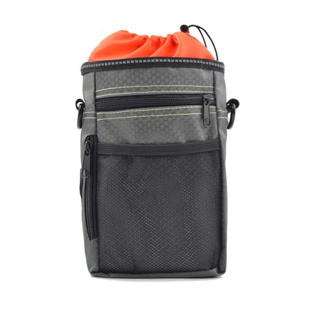 Portable Dog Training Bag made of durable Oxford cloth, featuring multiple pockets for treats, snacks, and poop bags, ideal for outdoor use.