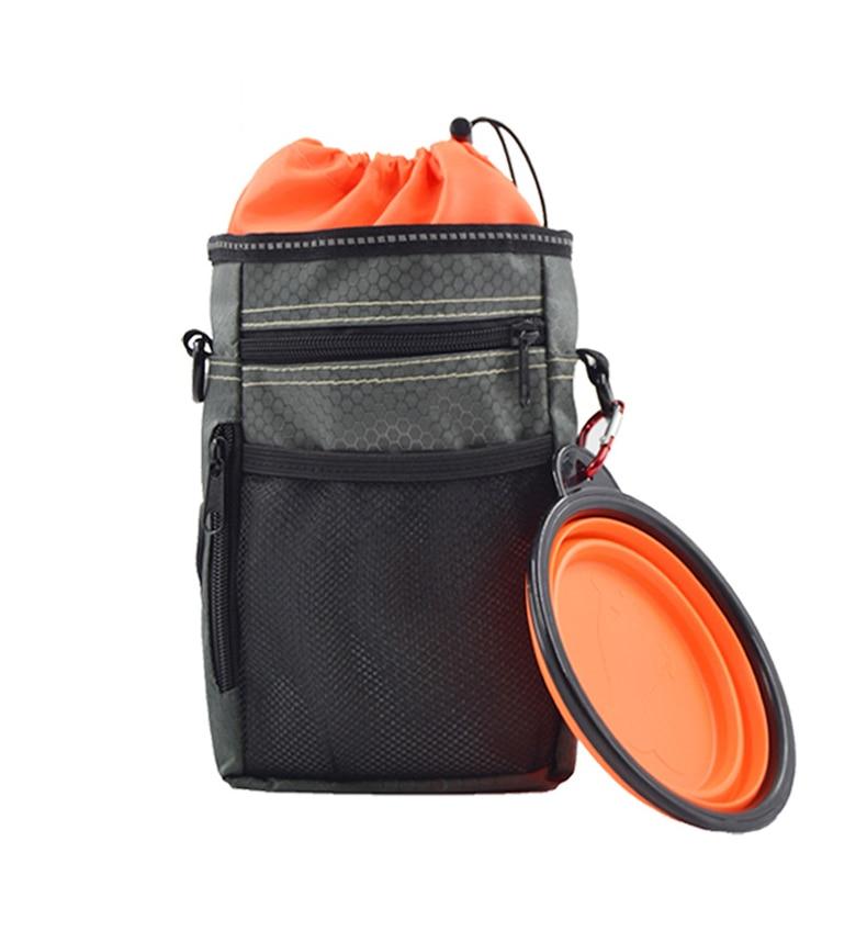 Portable Dog Training Bag made of durable Oxford cloth, featuring multiple pockets for treats, snacks, and poop bags, ideal for outdoor use.