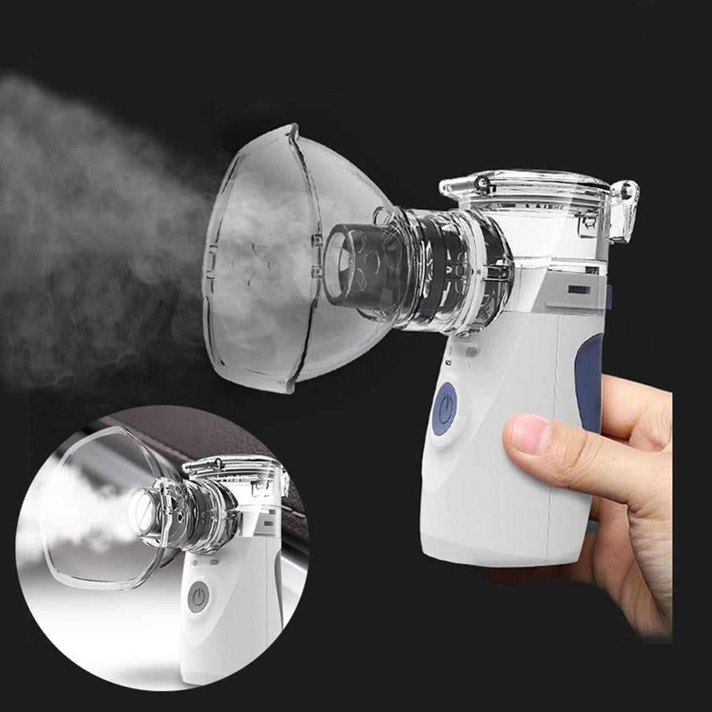 Portable Handheld Nebulizer Mist Inhaler with accessories including masks and USB cable, designed for easy use and portability.