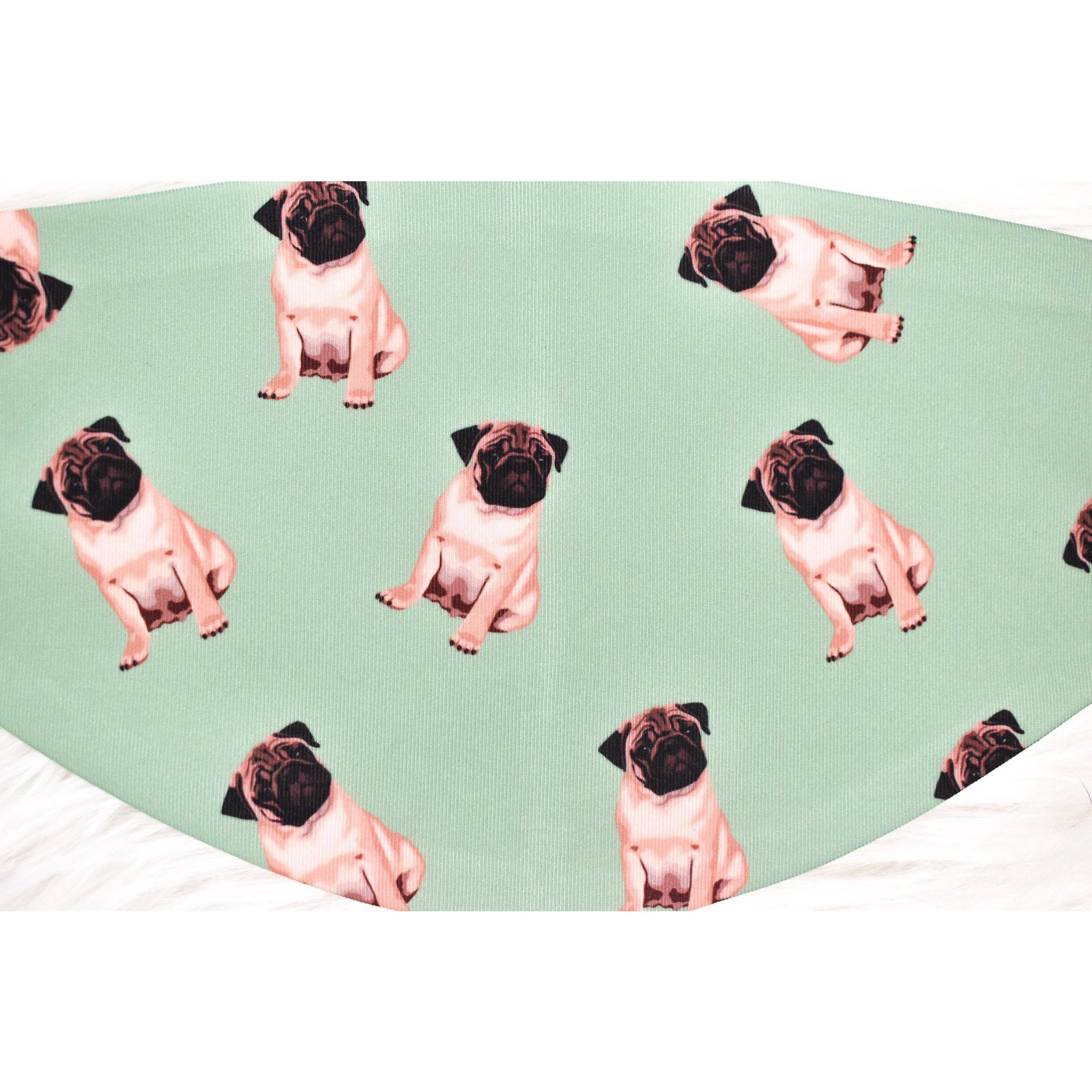A handmade pug face cover featuring a cute pug design, made from breathable polyester and organic cotton, suitable for adults.