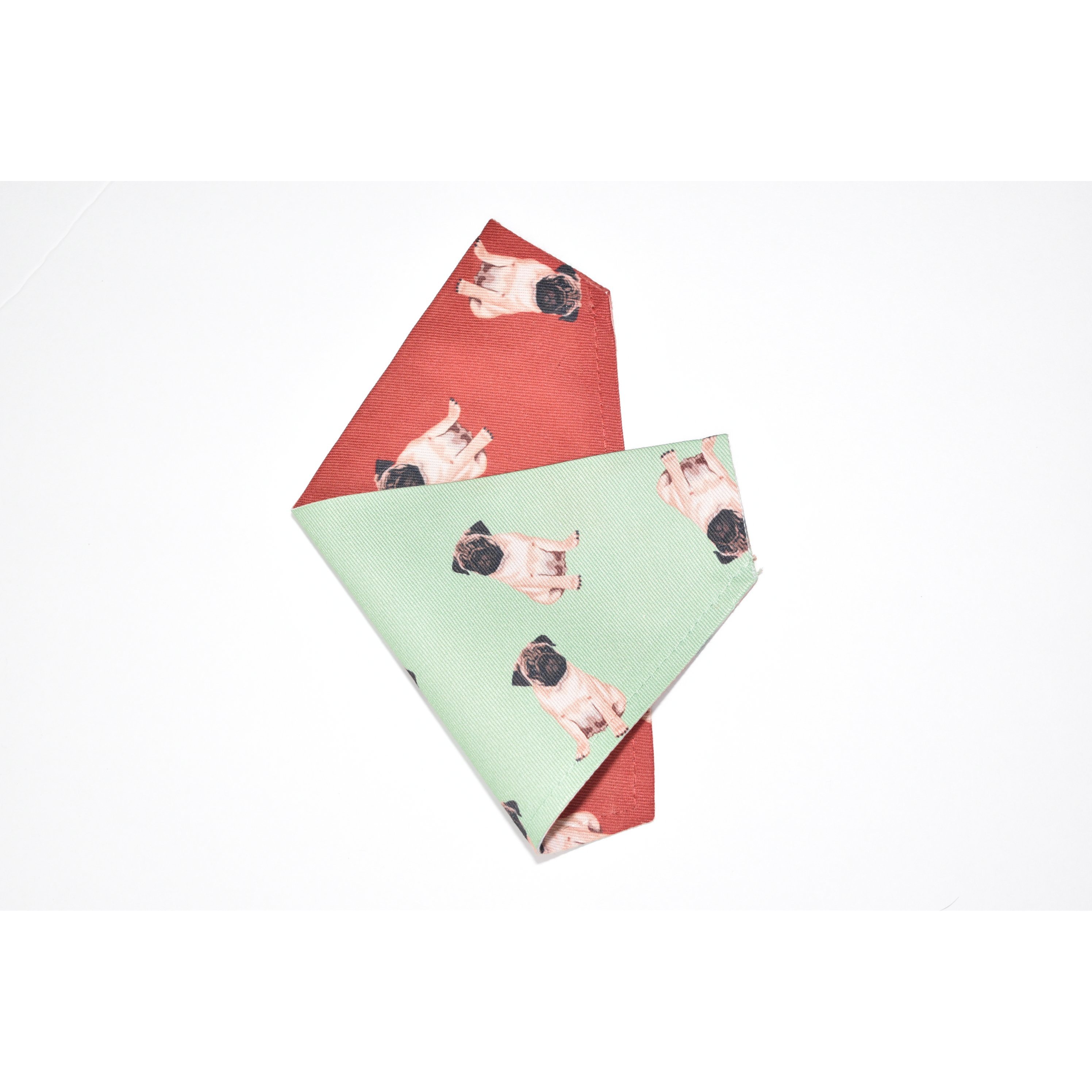 A stylish slip-on bandana designed for pugs, made from durable canvas fabric, featuring a unique pattern and a secure fit over the collar.