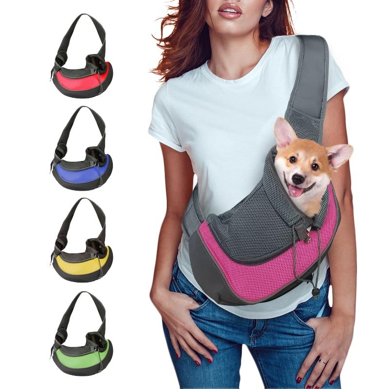 A stylish puppy or kitten travel shoulder bag made of durable mesh fabric and nylon, featuring a zippered opening and adjustable drawstring.