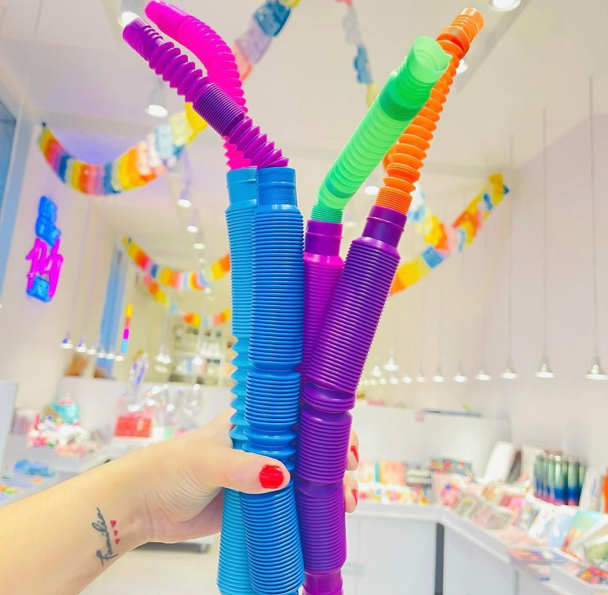 Colorful Push Pop Fidget Sensory Tunnels collection made of durable silicone, featuring various bubble shapes for interactive play.