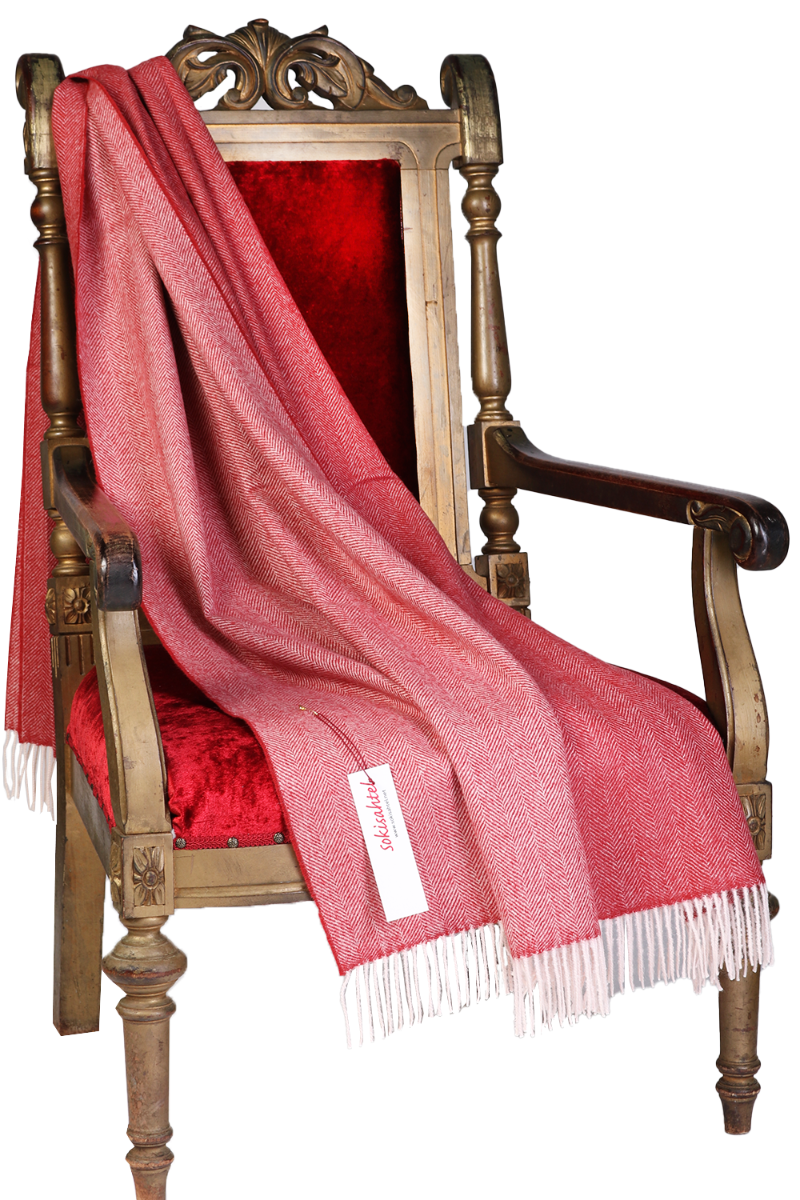 Luxurious red herringbone alpaca wool plaid, handcrafted with a fishtail pattern, perfect for winter warmth and home decor.