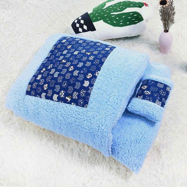 A cozy removable dog cat bed sleeping bag in soft pp cotton, perfect for winter warmth, available in multiple sizes.